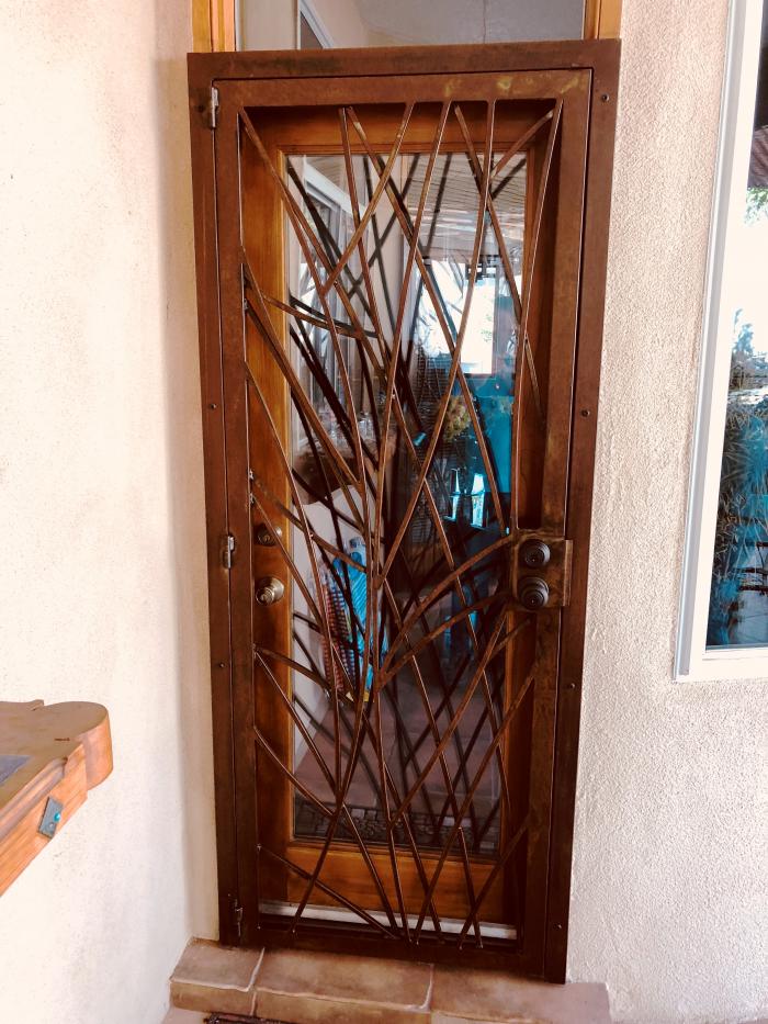 Wavy Bamboo chute security door in our Rustic Finish.