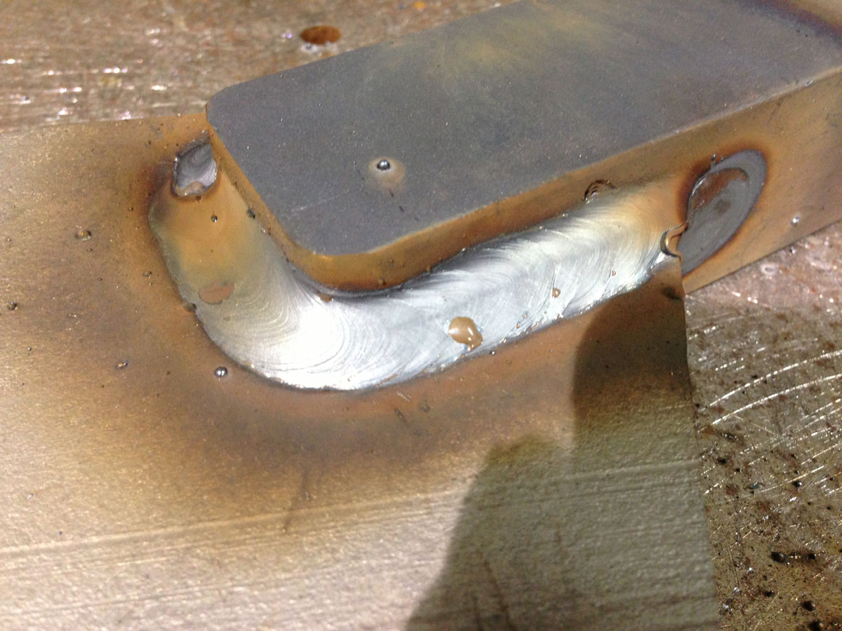 Close-up view of 1/2&quot; MS plate in a 1/2&quot; slot in a 1.5&quot; X 1.5&quot; solid steel bar stock.